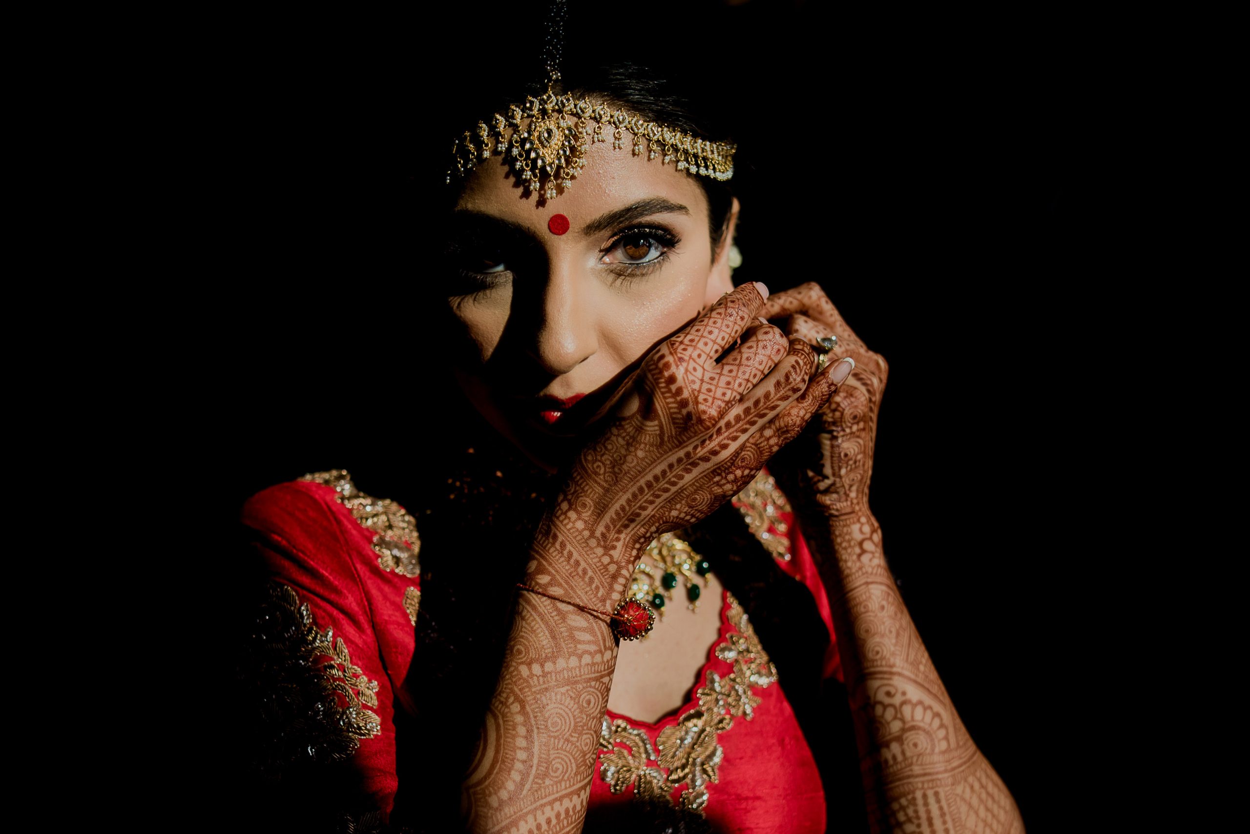 Intricate bridal mehndi design on a hand